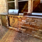 Outdoor kitchen with ledgestone