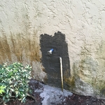 repaired stucco around hose bibb