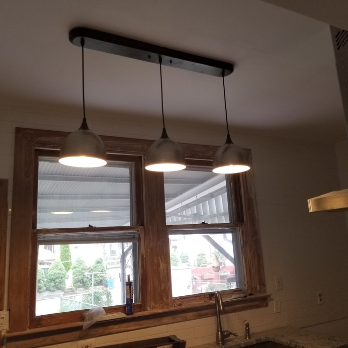 Pendant light installation in remodeled kitchen