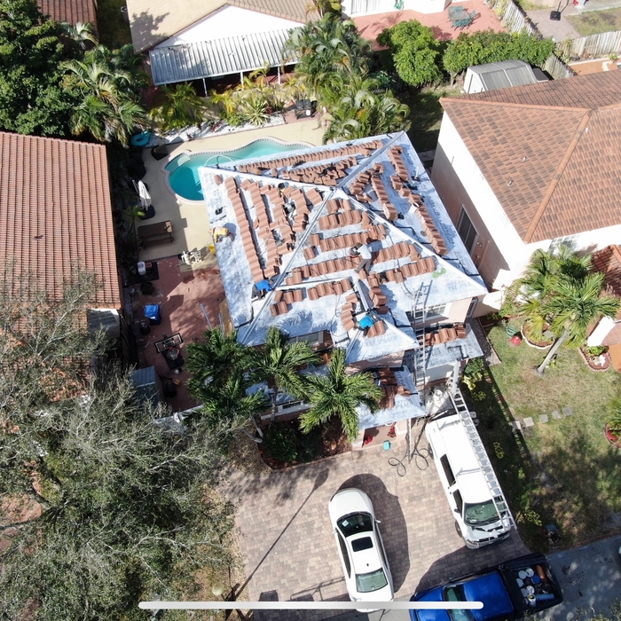 Re Roof Tile to Tile