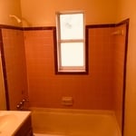 Bathtub and tile surround before