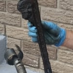 Fished out pipe wrench from the sewar pipe
