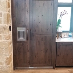 Thermador columns with custom wood panels