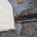 conduit coming up inside the garage