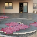 Stamped patio with fireplace