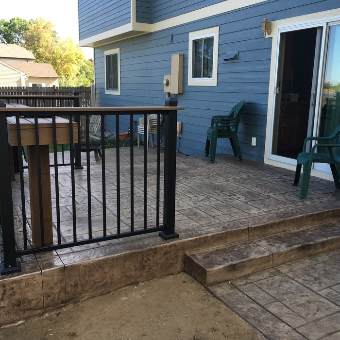 New Concrete Patio with Deck Style Features