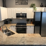 White cabinets with black accents