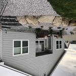 Boulder wall and stone steps