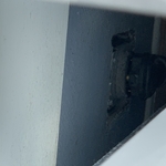 Missing electrical plate cover behind dryer