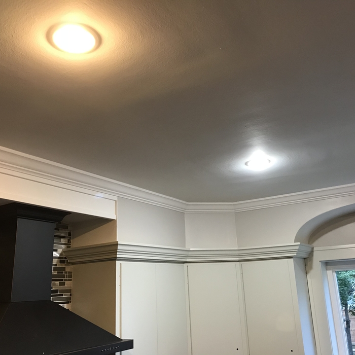 Cabinets refacing and crown molding installation.