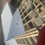 Metal white roof with front porch