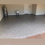 Residential three car garage. After epoxy install