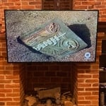 Tv mounted -Exposed Brick
