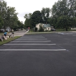 Seal coating patch work and parking lines