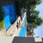 Clean pool and spa automatic covers