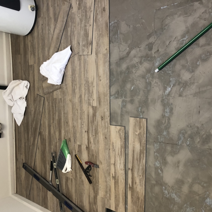 During laying flooring