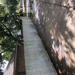 Courtyard area floor and walls “Before&rdquo