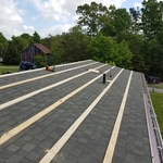 Install purlin boards