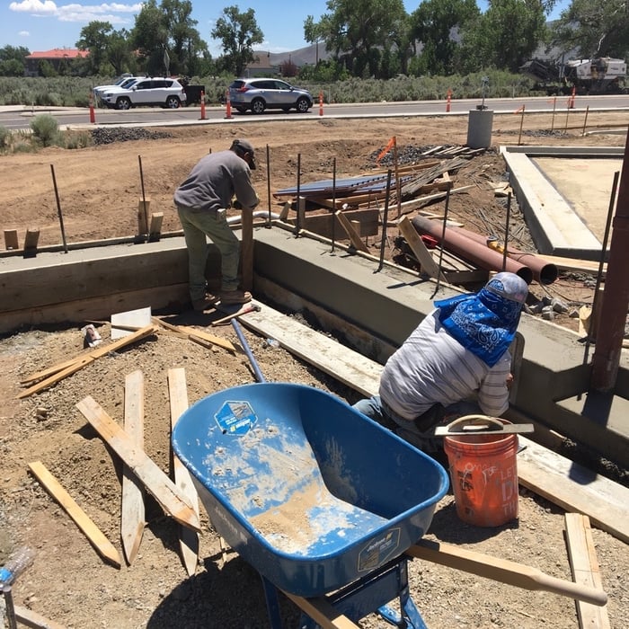 Stripping Trash Enclosure curb