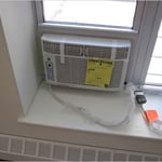 Window unit installation for an apartment