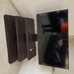 55' tv mounted on tv stand