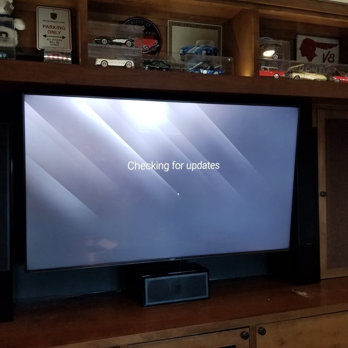 70' tv mounted on wall