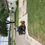 Son learning to mow
