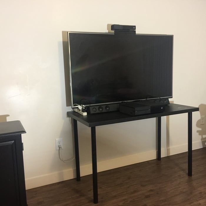 Tv before wall mount