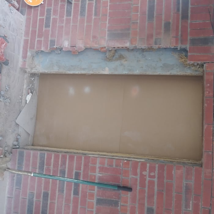 After demolishing old door and re framing