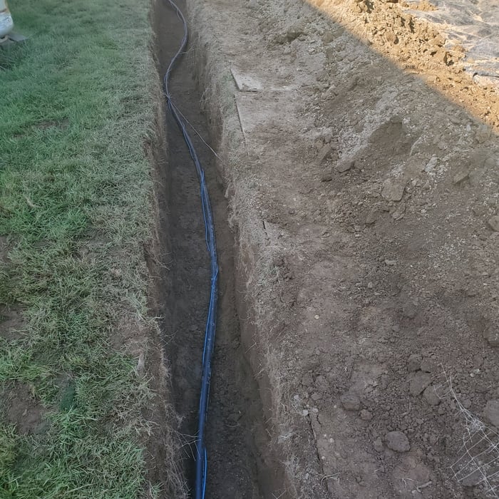open trench and pipe installation