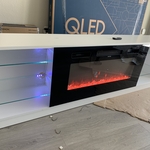 Assembled an entertainment center and glass firepl