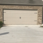 Almond carriage style garage door