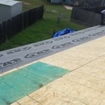 Laying Synthetic Felt Over New Sheathing