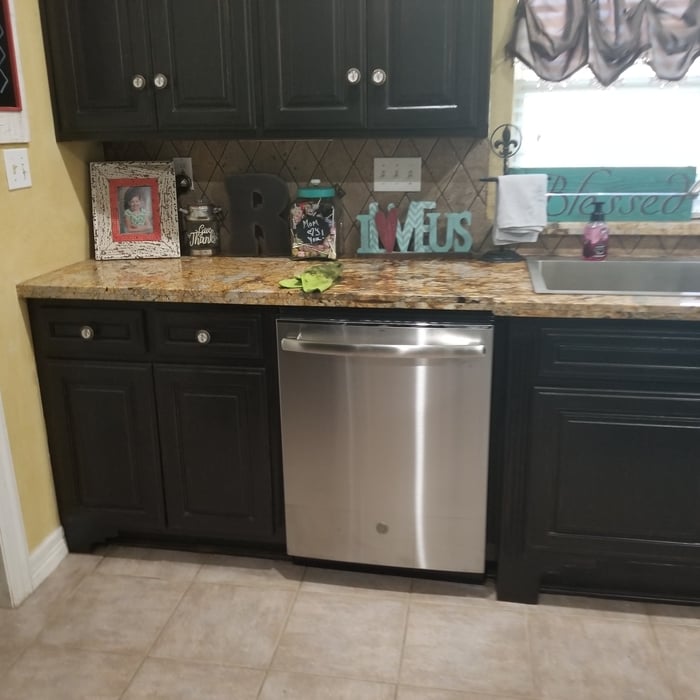 Dishwasher install and stain cabinets
