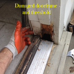 Damaged doorframe and threshold