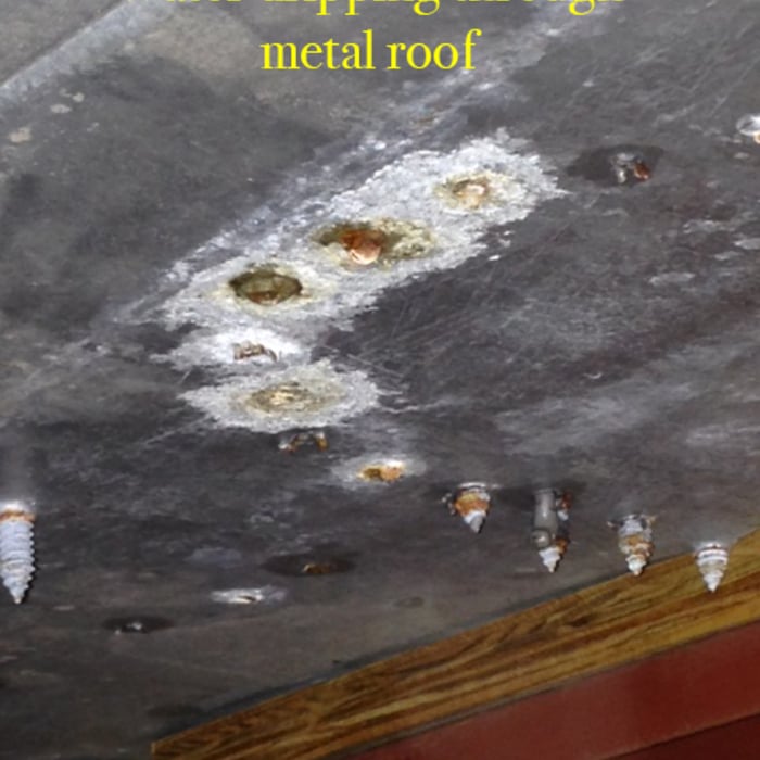 Water dripping through metal roof