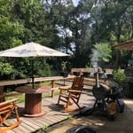 Table, deck and powder coated steel fence