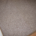 Carpet in the same doorway after my repair