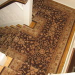 Stair runner installation with miter