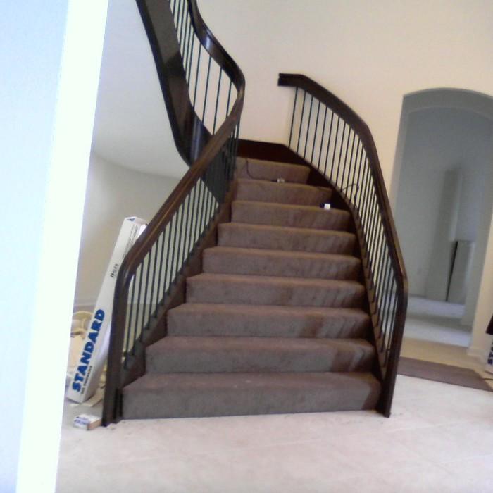 Carpet install on elliptical stairs