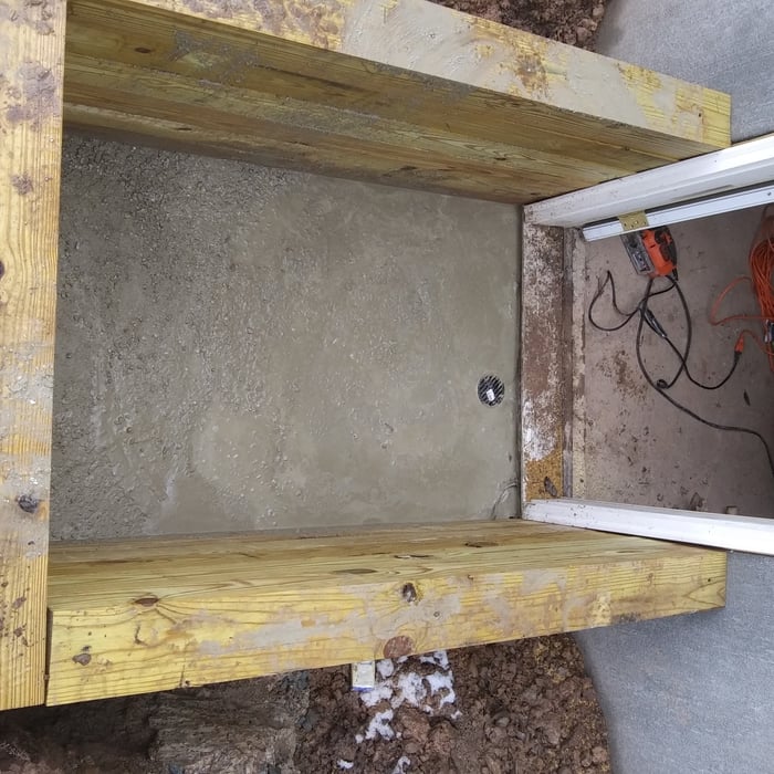 retaining wall with cement and drain