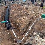 Tank and drain field