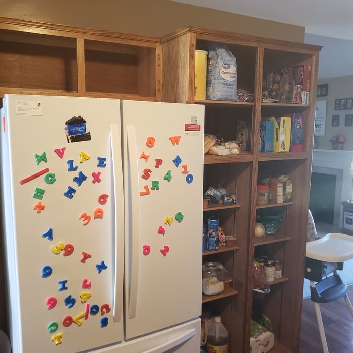 Before Picture of cabinet refinishing