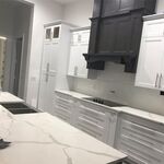 Calacatta Stone with White Cabinets