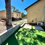 Concrete squares/small retaining wall/turf