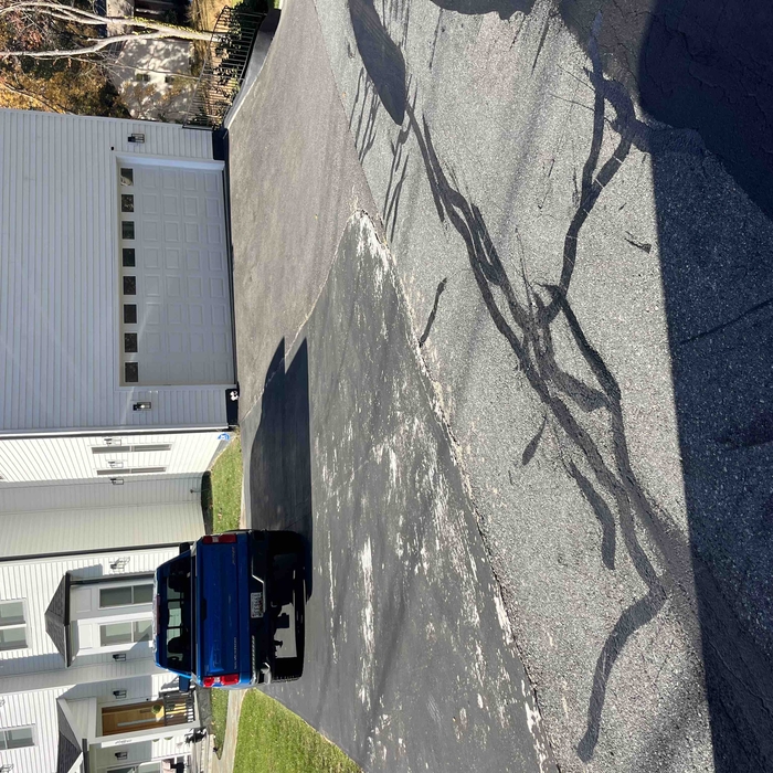 Driveway seal coating