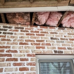 Damaged area with boards removed