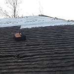 steel roof job tree had put a hole in roof