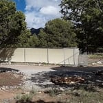 Fence with privacy net