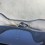 RV roof with large opening in lap sealant.